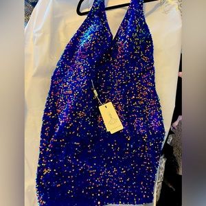 Navy halter cocktail dress. Lightweight with some stretch and thin AB sequins.